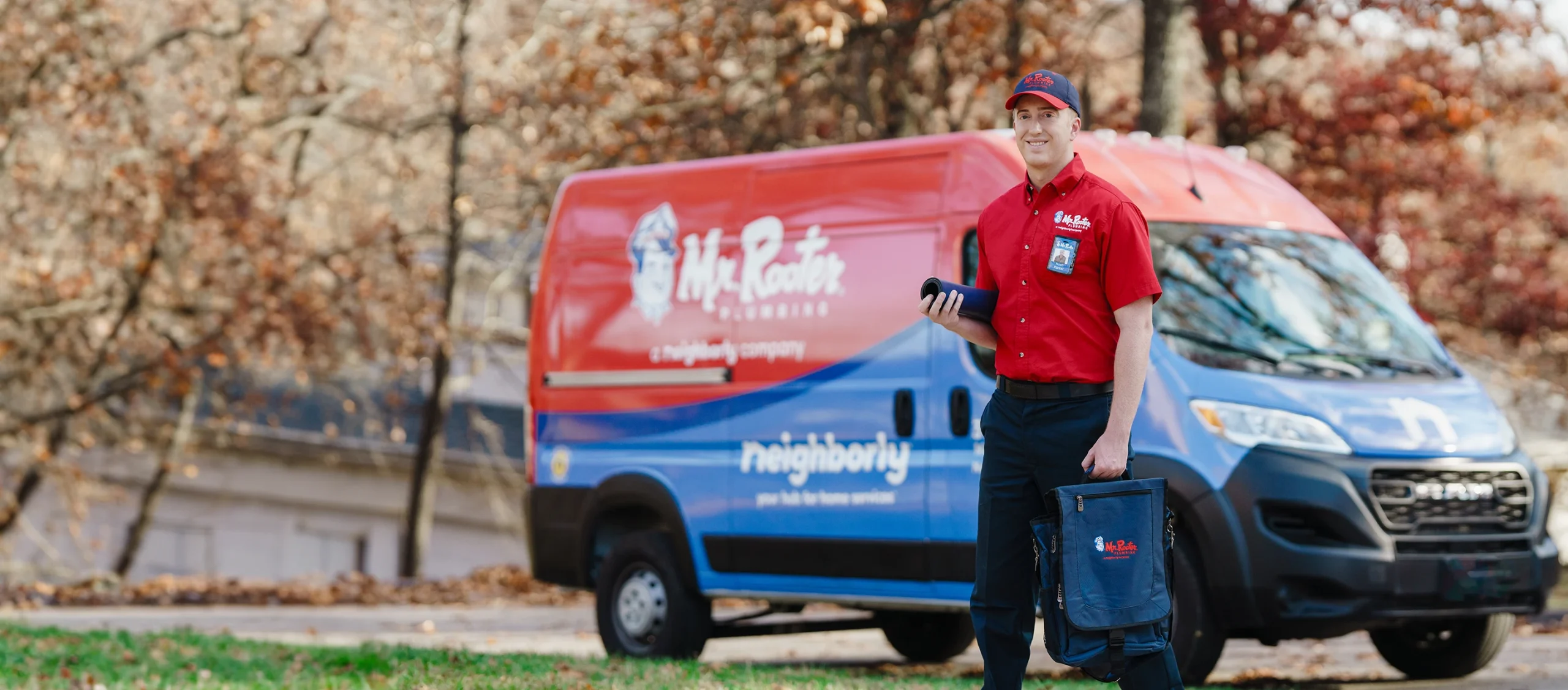 Mr. Rooter plumber arriving at a Connecticut home with a floor mat and tool bag